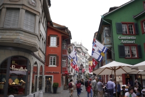 Colorful houses and flags on a street in Zurich
