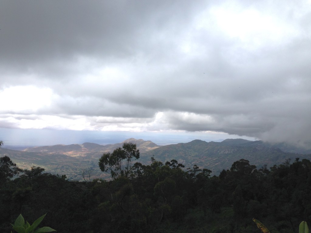 The dark landscape underneath a thick cloud cover in the Taita Hills, Kenya