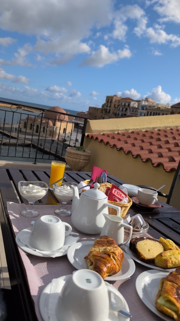 Breakfast outside on our own rooftop terrace in Chania, Crete